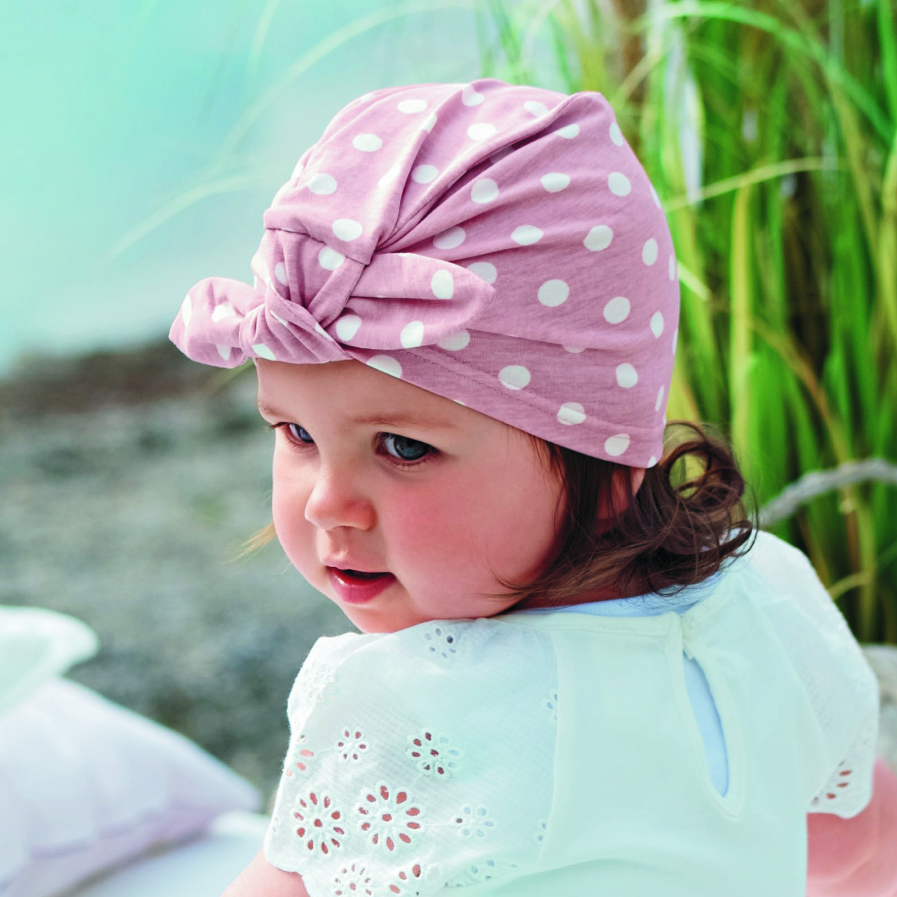 Sterntaler čepička dívčí s uzlem, starorůžová s puntíky, bavlněný jersey UV 15+, 1412060